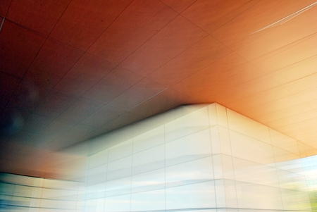 Modern building. Modern office building with a facade of glass.Blurred complex.の写真素材