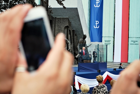 Warsaw, Poland. 6 July 2017. President Donald Trump speaks to the People of Poland. Speech at Krasinski Square. Unqnown man filming live event with his iPhone smartphoneのeditorial素材