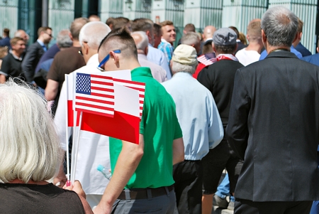 Warsaw, Poland. 6 July 2017. President Donald Trump speaks to the People of Poland.Crowd enthusiastically wave flagsのeditorial素材