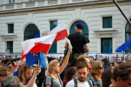 Warsaw, Poland. 24 July 2017. Protesters rally in front of the presidential palace in Warsaw. Protesters hold posters reading "constitution" during a demonstration in front of the presidential palace.のeditorial素材