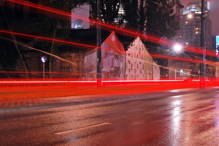 Warsaw, Poland. 22 September 2017. Straight street. City traffic at night. blurred cars driving during heavy rain and splashing water from the wheels.のeditorial素材