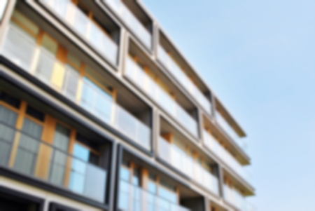 Abstract blur of modern apartment building.