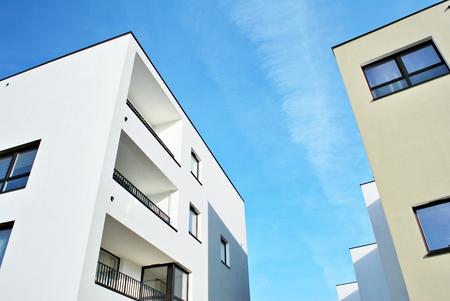 Modern apartment buildings on a sunny day with a blue sky