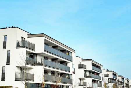 Modern apartment buildings on a sunny day with a blue sky. Facade of a modern apartment buildingの写真素材