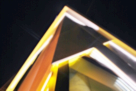 Blurred night skyscrapers with glass facade. Modern buildingsの写真素材