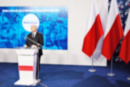 Blurred spokesman in background. News conference.の写真素材