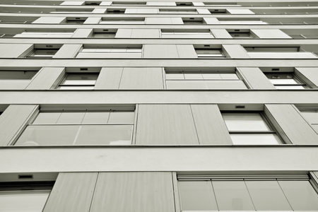 Modern apartment buildings. Facade of a modern apartment building. Black and white.
