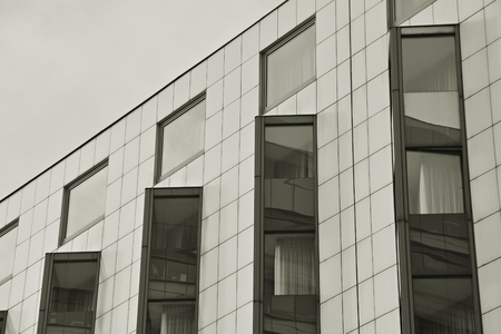 Office building. Business building. Exterior of building. Black and white.