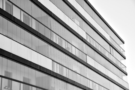 Facade of a modern apartment building. Black and white