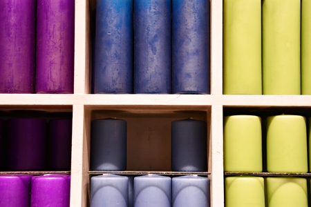 Candles for Sale. Closet full of different gifts in a interior decorating store.の写真素材