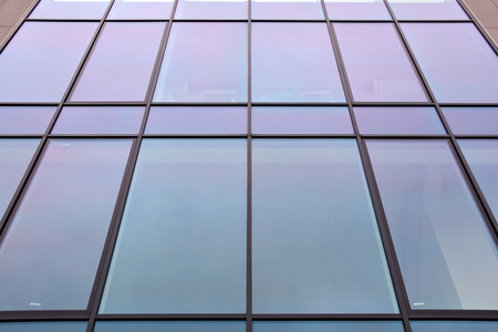 Glass walls of a office building - business background