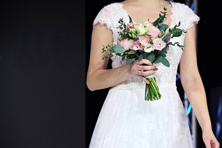 bride holding a wedding bouquet