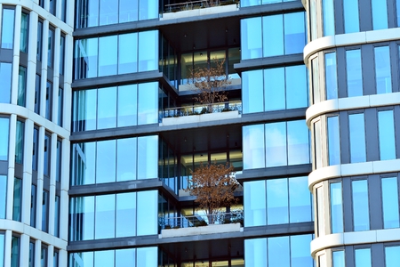 Glass walls of a office building - business backgroundの写真素材