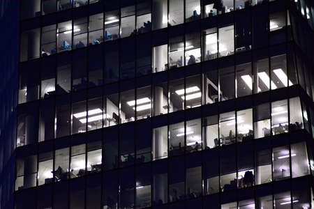 Window of the multi-storey building of glass and steel office lightingの写真素材