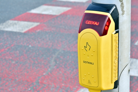Crosswalk button for pedestrian. Push this button to cross