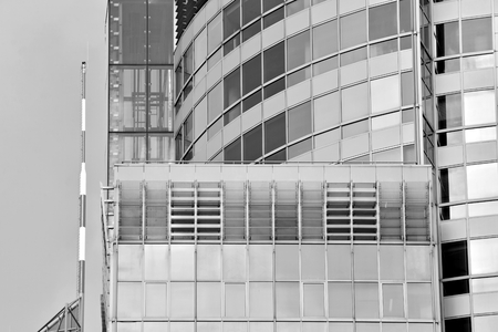 Glass walls of a office building - business background. Black and white.の写真素材