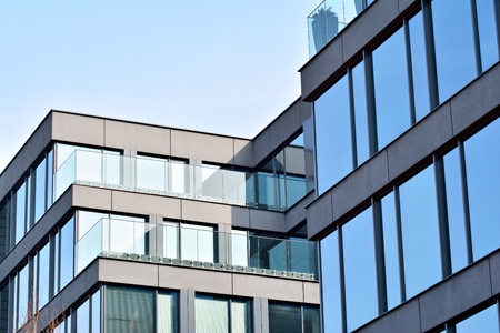 Glass walls of a office building - business background.