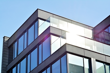 Glass walls of a office building - business background.の写真素材