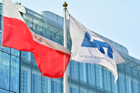 Warsaw, Poland. 5 March 2018. Polish national flag and PLL LOT company flag