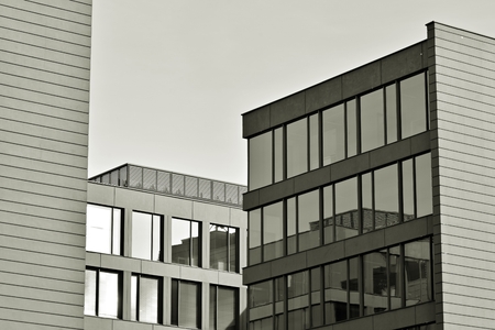 Glass walls of a office building - business background. Black and white.の写真素材