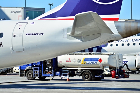 Warsaw, Poland. 18 March 2018. Warsaw Chopin Airport. The plane at the airport on loading. Plane...