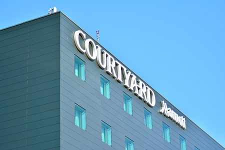 Warsaw, Poland. 18 March 2018. Sign Courtyard Marriott. Company signboard Courtyard Marriott.のeditorial素材