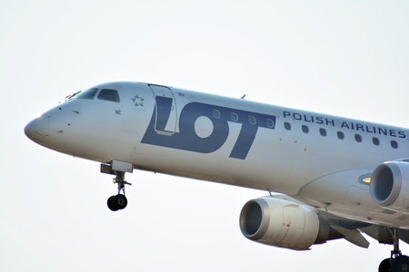 Warsaw, Poland. 25 March 2018. Passenger airplane LOT Polish Airlines just before landing at the...
