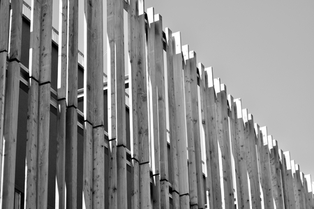Modern office building wall made of steel and glass. Black and white.の写真素材