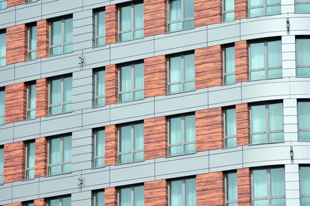 Modern office building wall made of steel and glassの写真素材