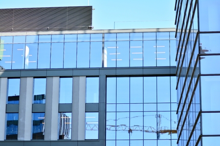 Modern office building wall made of steel and glass