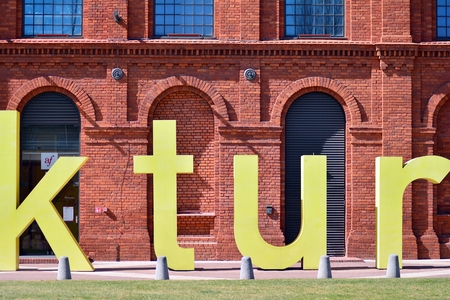 Lodz, Poland. 7 April 2018. Shopping Mall Manofaktura in Lodz transformed from industrial buildings into an elegant place for shopping.のeditorial素材