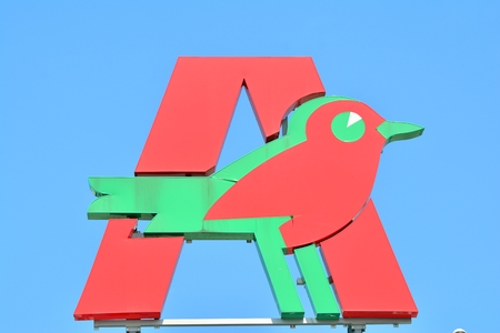 Warsaw, Poland. 4 May 2018. Sign Auchan. Company signboard Auchan.のeditorial素材