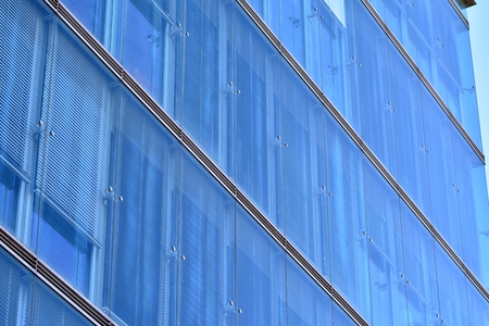 Urban abstract background, detail of modern glass facade, office business building