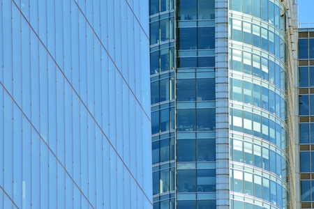 Urban abstract background, detail of modern glass facade, office business building