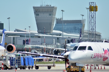 Warsaw, Poland. 6 June 2018. Warsaw Chopin Airport. Airplane at the airport after landing. The plane at the airport in Warsaw. Airplanes are parked at the airport, close to refill trucks.のeditorial素材