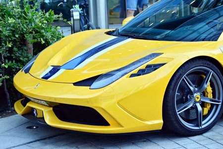 Warsaw, Poland.9 June 2018. Coffee and Cars - DaftCafe show meeting in Warsaw. Spire skyscraper on European Square. Close-up view of Ferrari sports car rear light.のeditorial素材