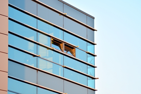 Modern office building wall made of steel and glass