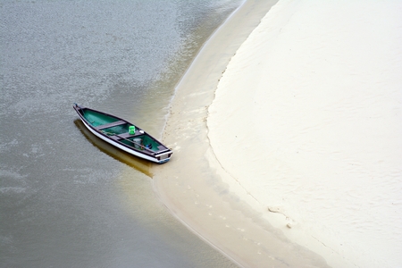 Boat on a sandy beachの写真素材