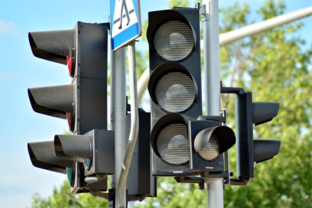 Traffic lights above a street
