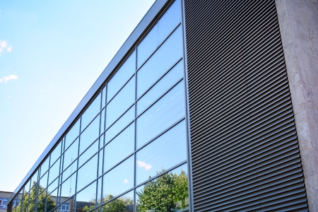 Modern office building wall made of steel and glass