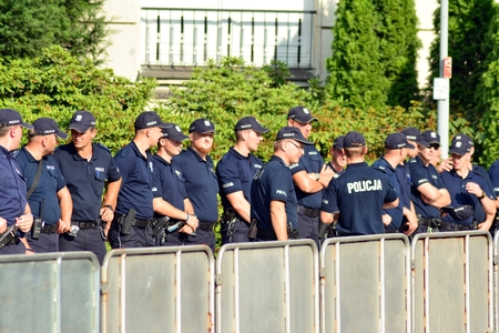 Warsaw, Poland. 20 July 2018. Police in front of the Polish parliament. Police stands guard during a political protest.のeditorial素材