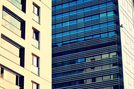 Modern apartment building exterior. Retro colors stylizationの写真素材