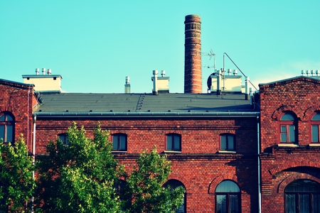 Revitalized red brick buildings. Retro colors stylizationの写真素材