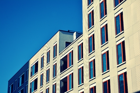 Modern apartment building exterior. Retro colors stylization