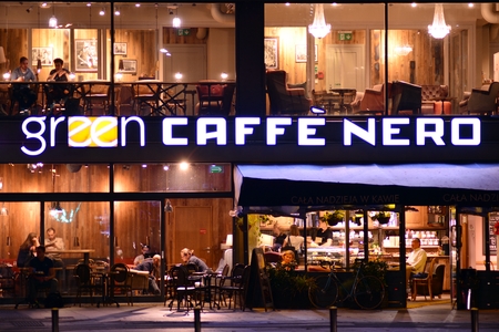 Warsaw, Poland. 10 September 2018. Sign Green Caffe Nero. Company signboard Green Caffe Nero.のeditorial素材