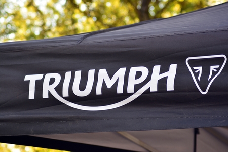 Warsaw, Poland. 29 September 2018. Sign Triumph. Company signboard Triumph.のeditorial素材