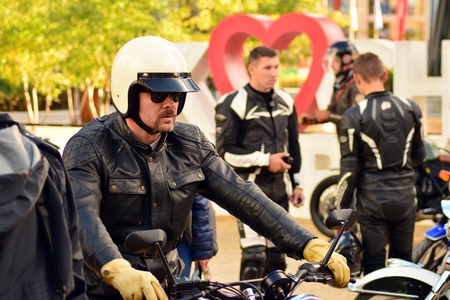 Warsaw, Poland. 29 September 2018. The Distinguished Gentleman's Ride on the European square. Motorcyclist on motorbike with in helmetのeditorial素材