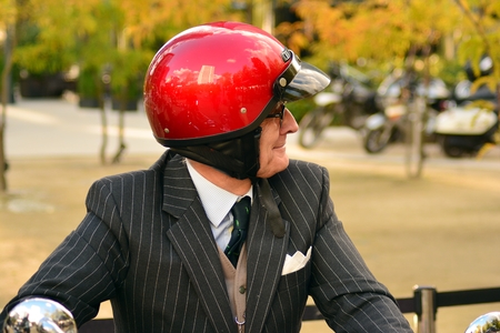 Warsaw, Poland. 29 September 2018. The Distinguished Gentleman's Ride on the European square. Motorcyclist on motorbike with in helmetのeditorial素材