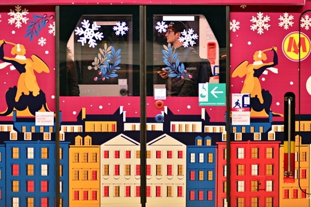 Warsaw, Poland. 7 December 2018. Warsaw Metro's illuminated christmas train arriving at Rondo Daszynskiego underground stationのeditorial素材