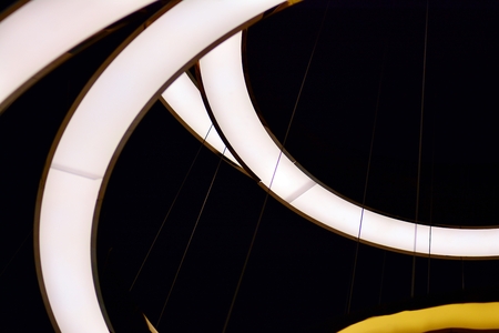 Abstract interior fragment. Stylized illumination with modern LED lampsの写真素材